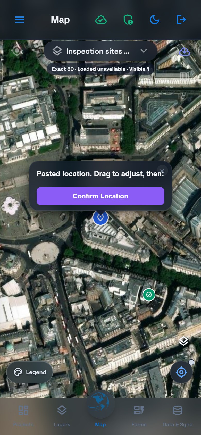 London satellite map showing a temporary pasted-location pin and Confirm Location before standard capture.