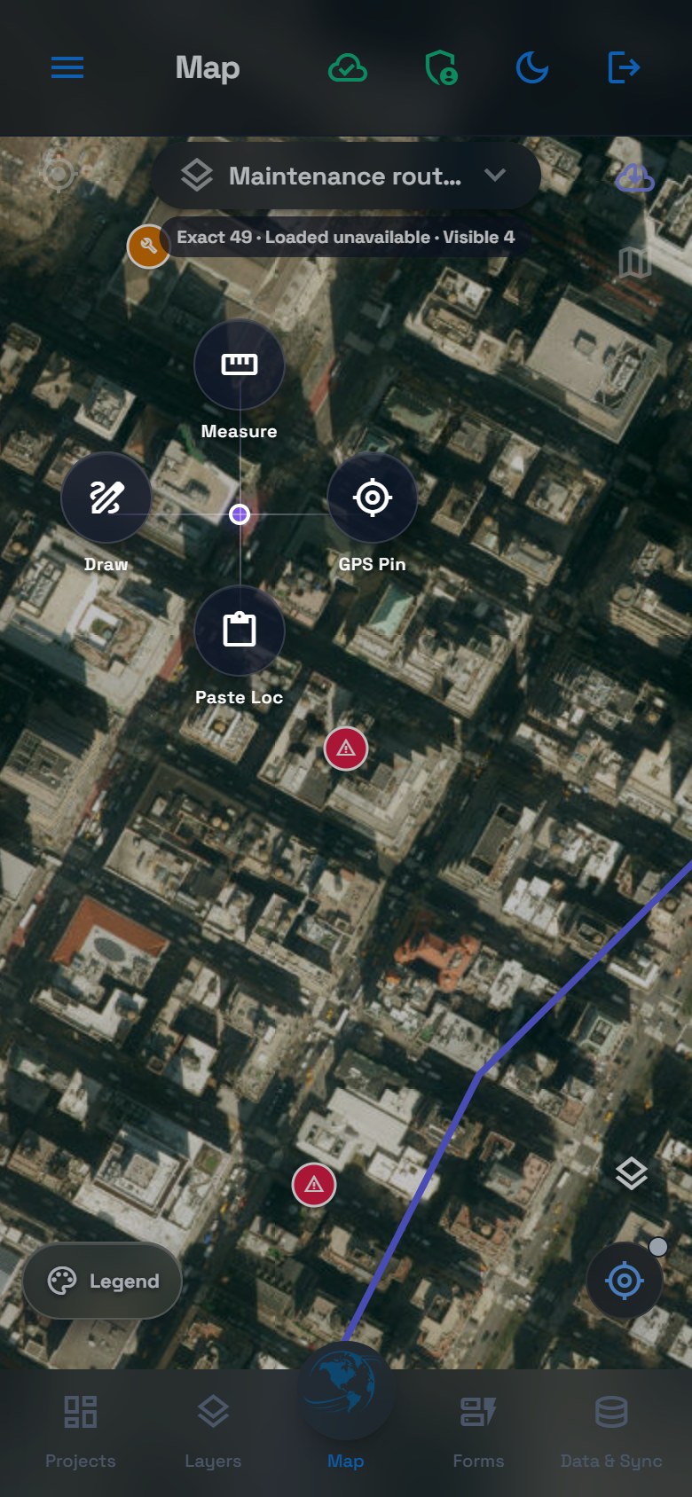 Radial menu on the dark satellite map offering Draw, Measure, GPS Pin and Paste Loc for the Maintenance routes layer.